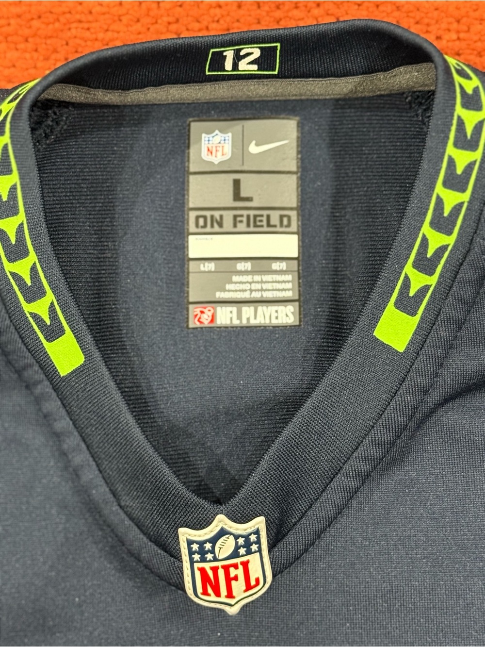 Nike Kids Navy V-Neck NFL Shirt with Neon Green Accents
